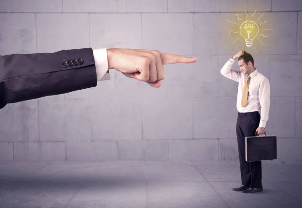 istock Boss blaming sales person with an idea 1005863860