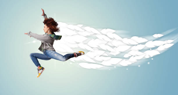 Young woman jumping outdoors
