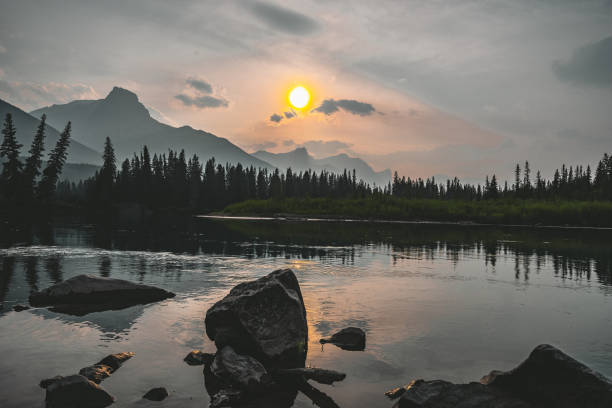 istock Scenic sunset views over bow river three sisters, Banff National Park Alberta Canada 1005867412