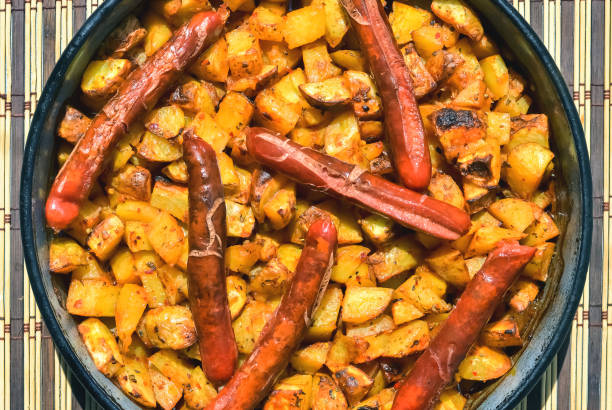 istock Baked sausages and potatoes 1005874396