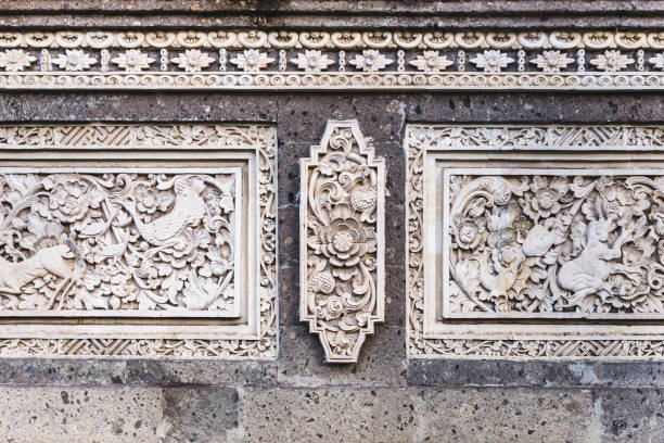 Traditional balinese stone carving, wall in temple