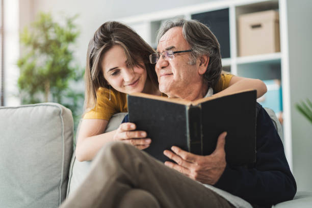 Young daughter hugging her father Young daughter hugging her father father and daughter stock pictures, royalty-free photos & images