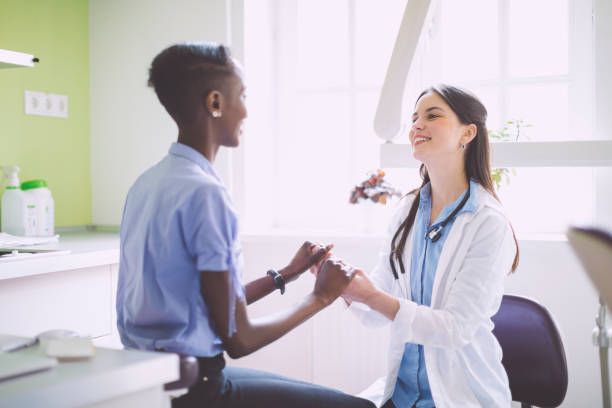 istock Doctor consulting her patient 1005890504
