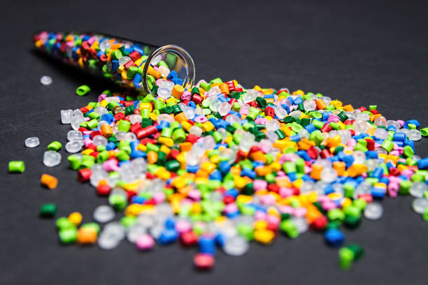 istock Plastic granules. Polymer pellets. Polymeric dye. Colorant pellets. 1005890824