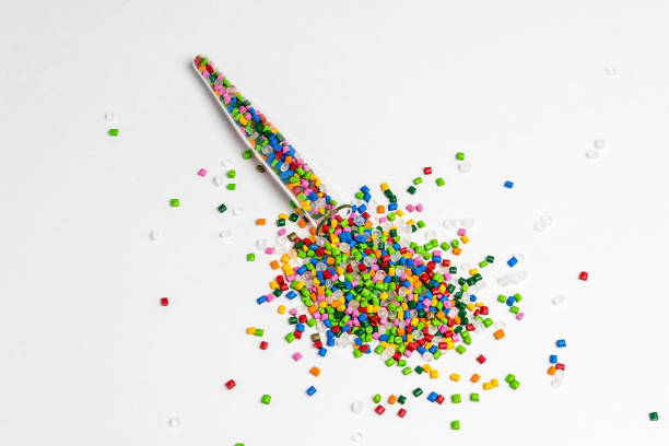 istock Plastic granules. Polymer pellets. Polymeric dye. Colorant pellets. 1005890852