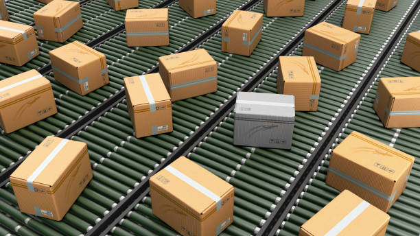 istock Modern Packages delivery packaging service and parcels transportation system concept cardboard boxes on conveyor 3d render 1005894086
