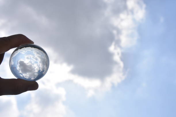 istock Reflection of the sky in a crystal ball 1005897138