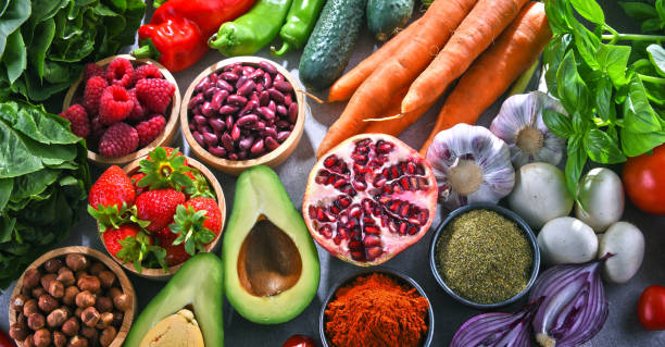 istock Composition with fresh vegetarian grocery products 1005897588