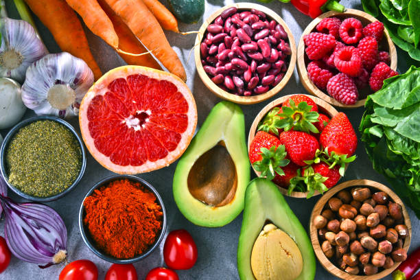 istock Composition with fresh vegetarian grocery products 1005897646