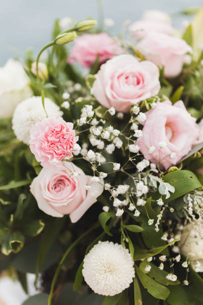 istock Wedding flower composition. Bouquet with gentle pink roses 1005897746