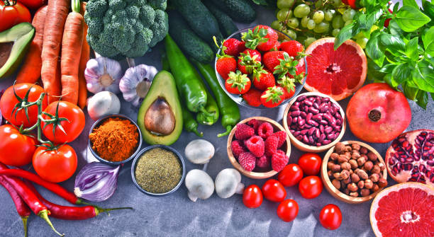 istock Composition with fresh vegetarian grocery products 1005897786