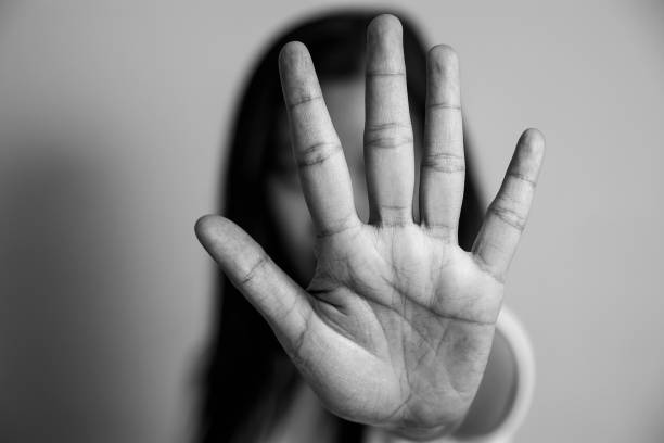 istock woman raised her hand for dissuade 1005900380