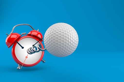 Golf ball with alarm clock isolated on blue background. 3d illustration