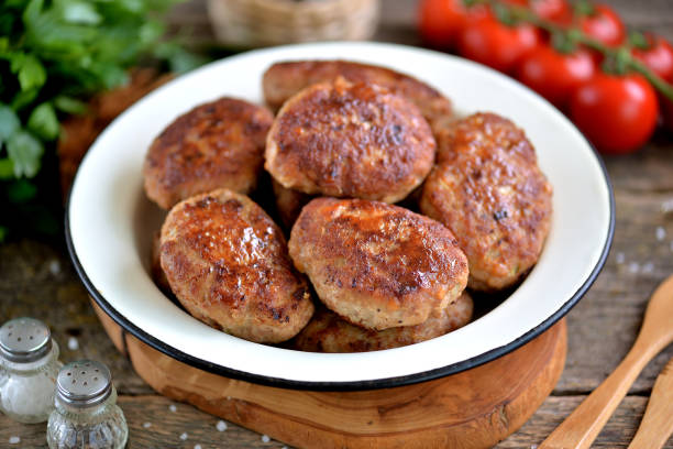 istock Homemade cutlets from minced pork and beef. Rustic food. 1005916010