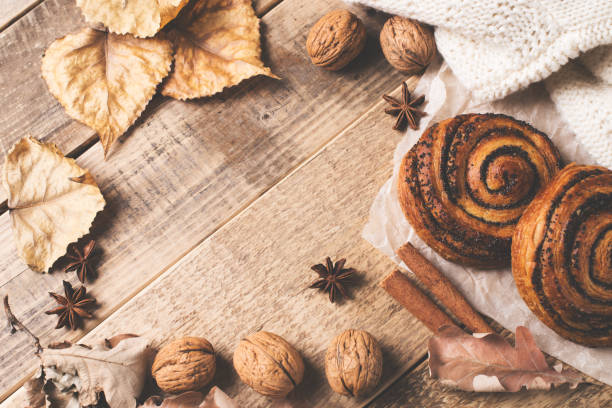 istock Autumn frame with pastry, leaves and spice 1005918458