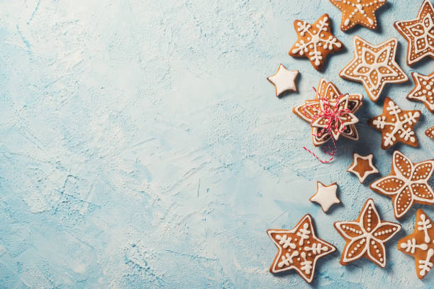 quadro de estrelas priánik na sobre textura azul - holiday cookies - fotografias e filmes do acervo