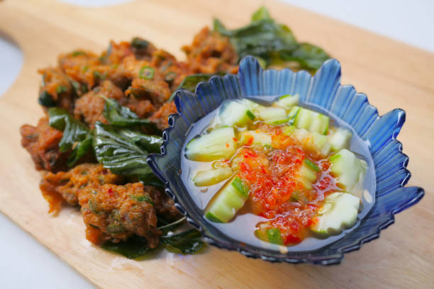 istock Fried fish-Paste Balls,serve with fresh vetgetable and sauce 1005931470