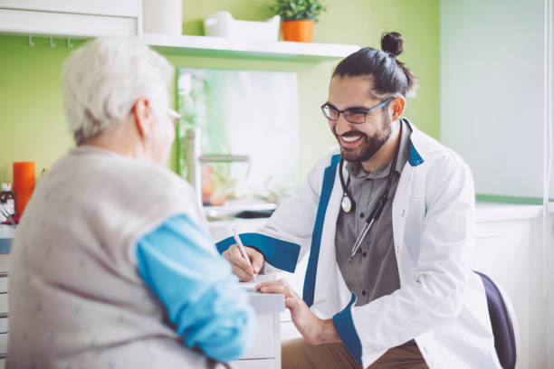 istock Doctor consulting his patient 1005932112