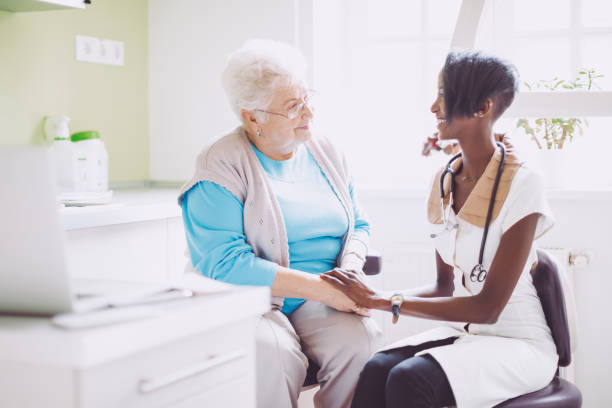 istock Doctor consulting her patient 1005932132