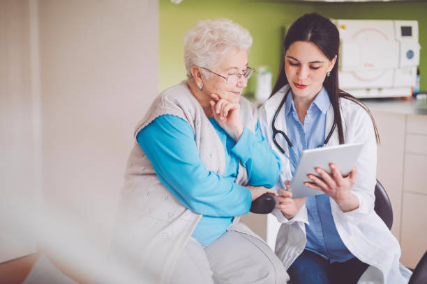 istock Doctor consulting her patient 1005934616