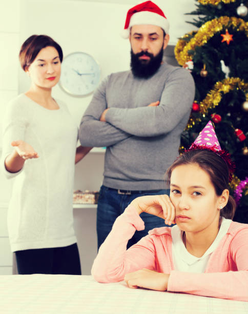 istock Parents lecturing daughter at Christmas 1005942066