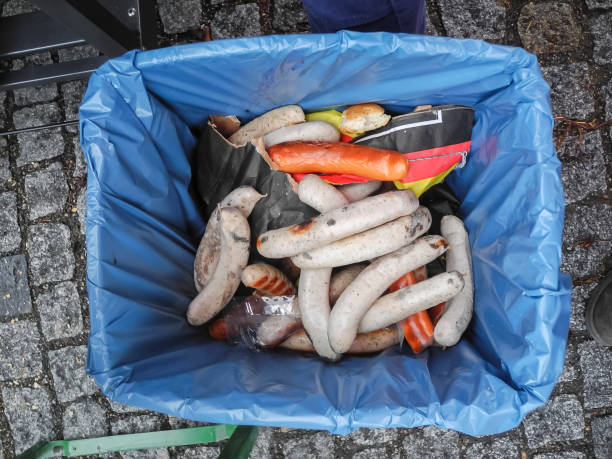 rill sausages in the trash can stock photo