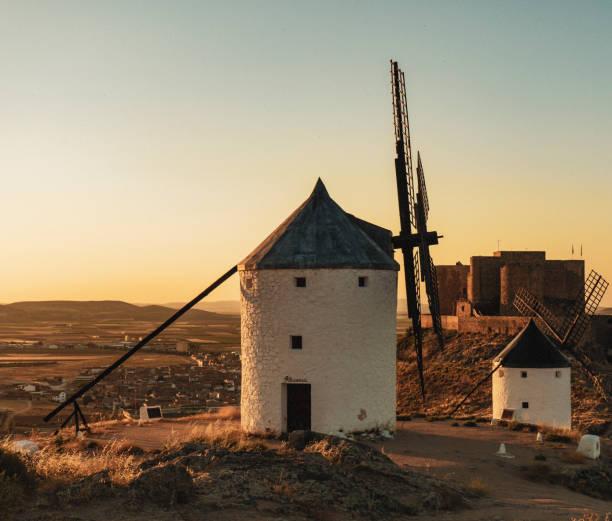 istock Old traditional windmills in Consuegra Toledo Castilla La Mancha Spain 1005949552