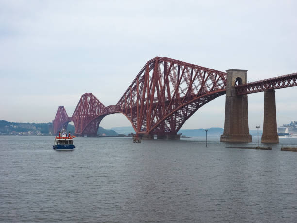 istock Forth Bridge over Firth of Forth in Edinburgh 1005952612