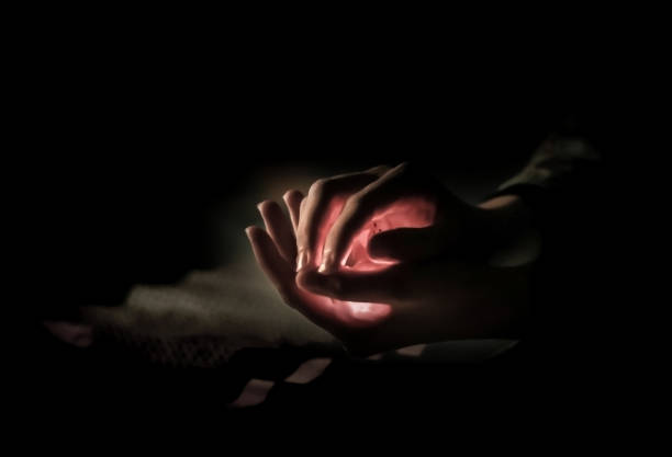 closeup .man and woman holding each other's hands