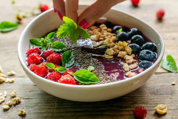 istock Berry purple smoothie bowl 1005967412