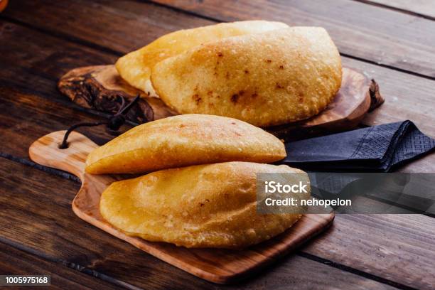 Fried Empanadas Stuffed With Chicken And Meat Stock Photo - Download Image Now - Empanada, Venezuela, Bread