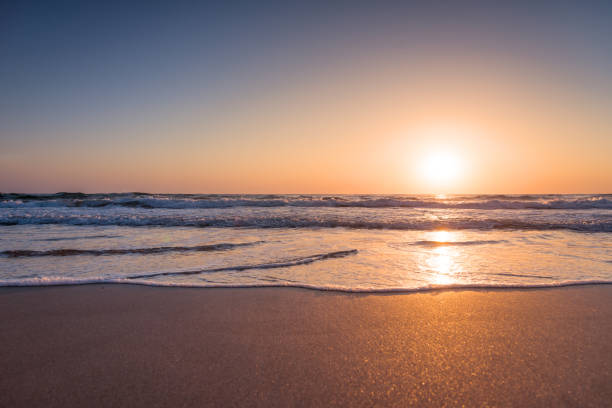 istock Beautiful sunrise over the sea 1005975232