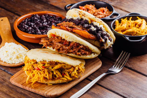 istock Latin American breakfast, Arepas with several ingredients. 1005975570