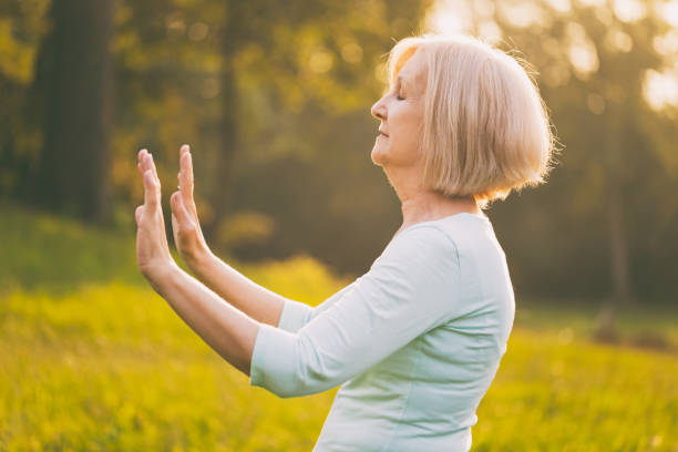 istock Senior woman exercise Tai Chi 1005978038