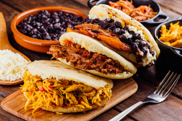 istock Latin American breakfast, Arepas with several ingredients. 1005978216
