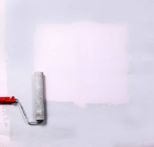 istock square painted white with the paint roller, on a white sheet of 1005978788