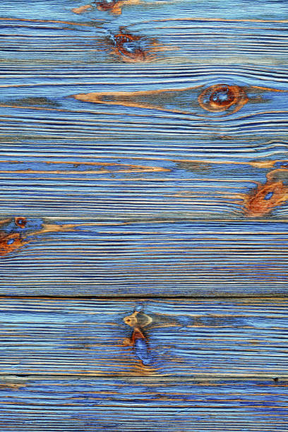 istock Blue vintage messy wooden background 1005981368