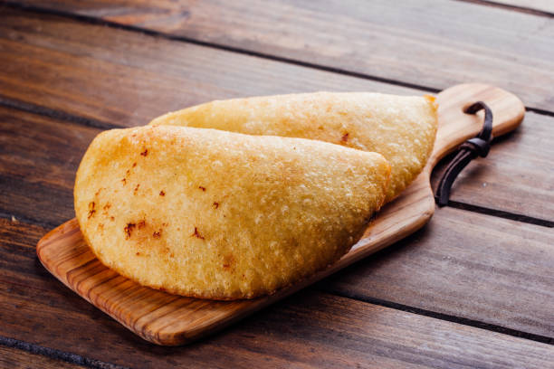 istock Fried empanadas, stuffed with chicken and meat 1005982898