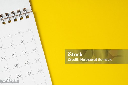 istock White clean calendar on solid yellow background with copy space, business, travel or project planning concept 1005983884