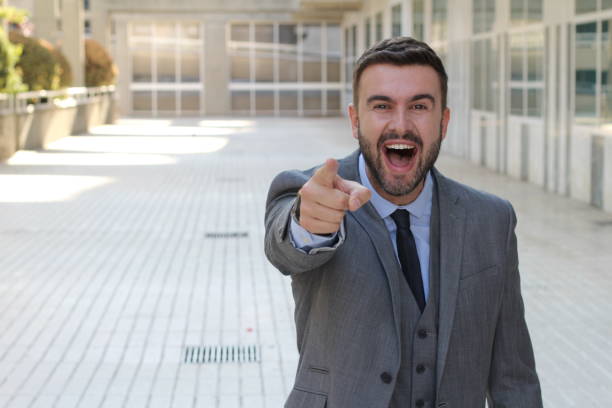 istock Businessman making fun of you 1005984048