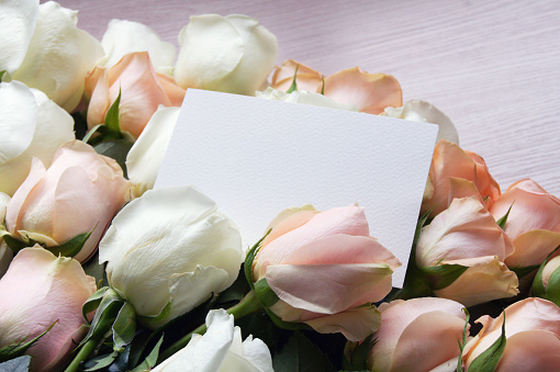 Photo of roses with blank card that you can use as template to show your designs.