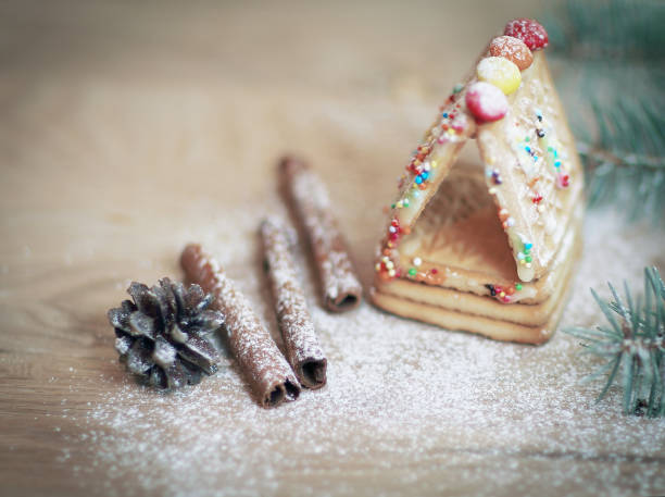 cinnamon sticks and cookies at the Christmas table