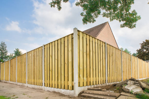 New wooden fence at garden of house stock photo