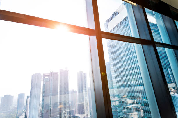 istock Modern building and cityscape outside the window 1006017316