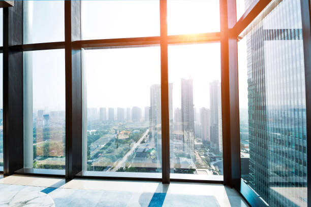 istock Modern building and cityscape outside the window 1006017448