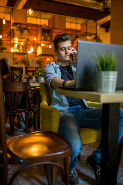 istock caucasian man at the caffee 1006017600