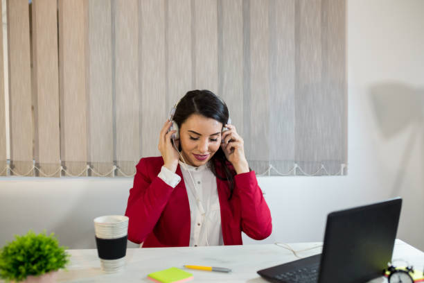 istock Beautiful girl in the office 1006023028