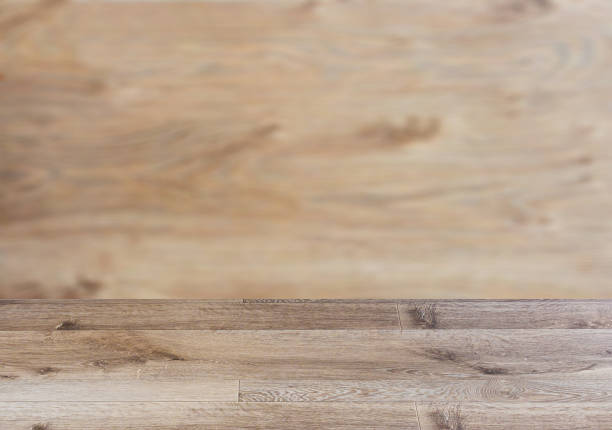 istock Background with empty wooden table. Flooring Texture of timbered board. Closeup. 1006023226