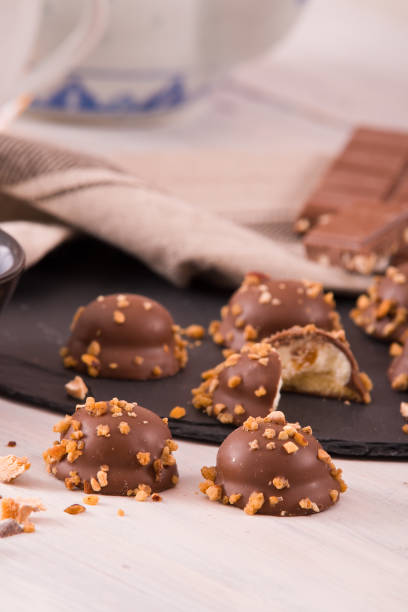istock Chocolate truffles with caramel cream filling. 1006038864