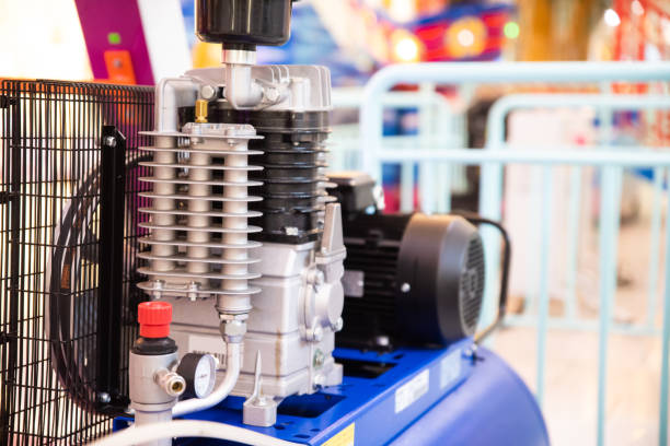 Close up air compressor engine machine. industrial engineering concept. Close up air compressor engine machine. industrial engineering concept. gas compressor stock pictures, royalty-free photos & images